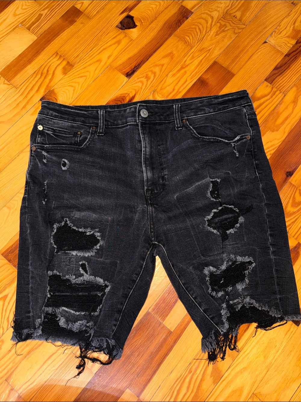 Distressed Black Denim Cutoff Shorts